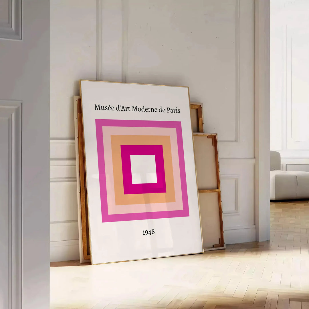 Framed graphic Paris poster styled on a living-room wall