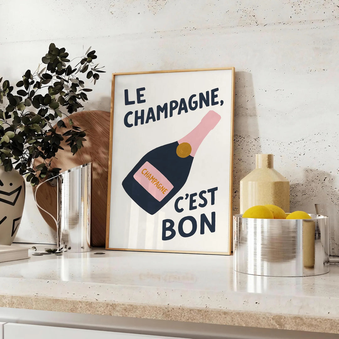Póster de cocina 'Le Champagne C'est Bon' en tonos elegantes de verde y negro, disponible en tamaños 50x70 y 30x40, enmarcado