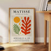 Póster Matisse Papiers Découpés com cores vibrantes em verde e laranja, ideal para amantes da arte. Disponível em vários tama