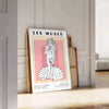 space Les Muses woman graphic poster black orange wall art thoughtful gift artwork artistic flair room multiple sizes A4 cm A0