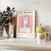 space Les Muses woman graphic poster black orange wall art thoughtful gift artwork artistic flair room multiple sizes A4 cm A0
