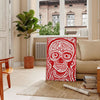 Une affiche captivante design crâne populaire teintes chaleureuses brun rouge décoration cadeau unique version cadre